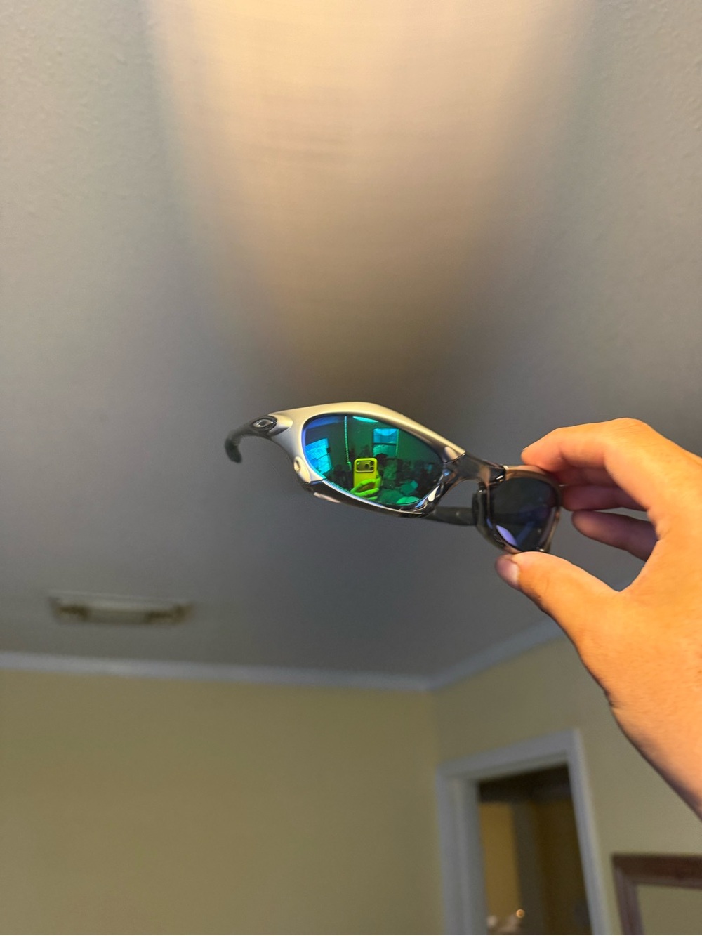 Oakley Polarized Wrap Sunglasses with Green Mirror Lenses and Silver Frame oakle